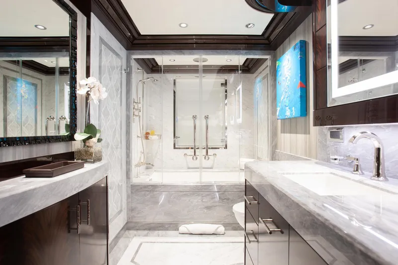Boardwalk Yacht Photos Pics Luxurious yacht bathroom with marble finishes, modern fixtures, and elegant decor, Feadship Custom 2021.