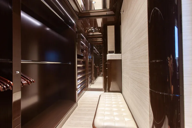 Boardwalk Yacht Photos Pics Luxurious yacht interior with sleek wood finishes and plush seating, Feadship Custom 2021 model.