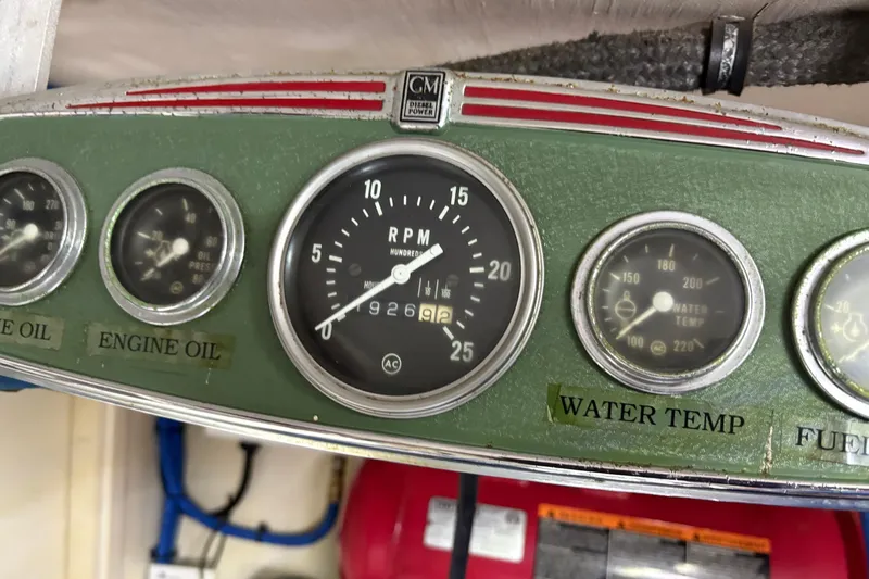  Yacht Photos Pics Instrument panel of a 1987 Hatteras 70 Cockpit Motor Yacht showing RPM and gauges.