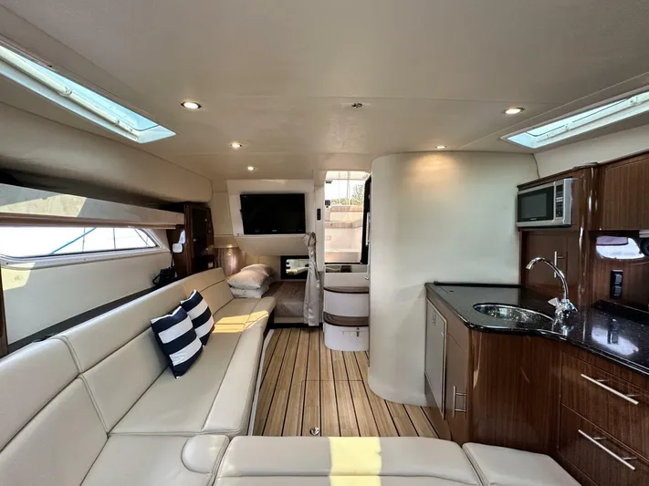  Yacht Photos Pics Luxurious interior of a 2014 Regal Sport Coupe yacht with modern amenities and elegant design.