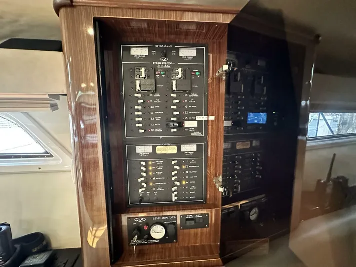  Yacht Photos Pics Control panel inside a 2014 Regal Sport Coupe, featuring switches and gauges.