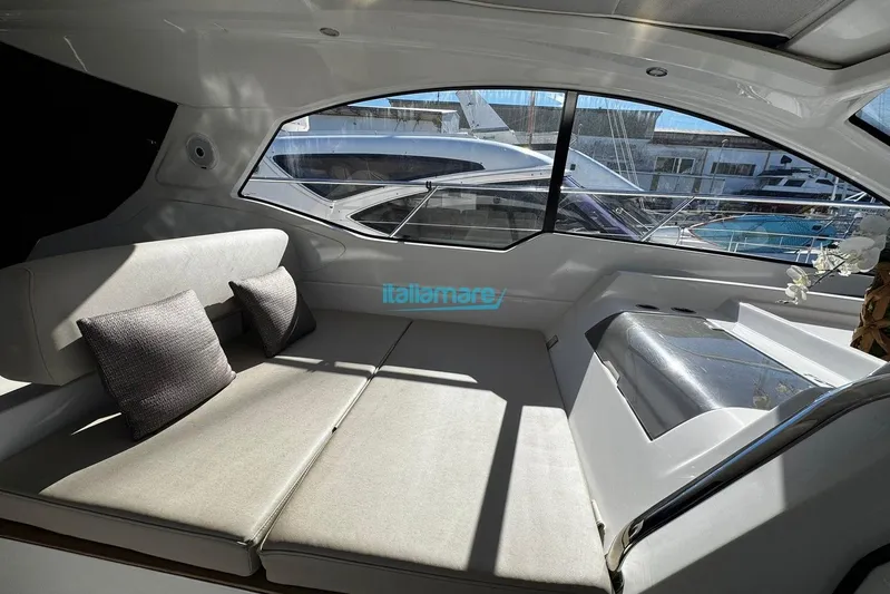  Yacht Photos Pics Interior of 2020 Azimut Atlantis 45 yacht with modern seating and large windows.