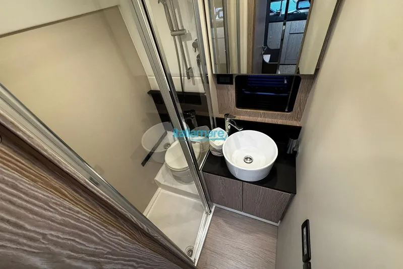  Yacht Photos Pics Modern bathroom in 2020 Azimut Atlantis 45 yacht with sleek fixtures and compact design.