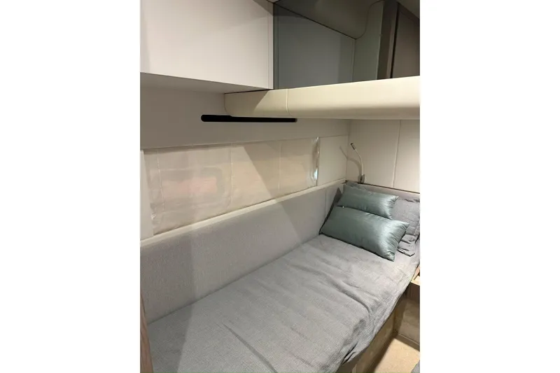  Yacht Photos Pics 2024 Azimut Fly 53 yacht interior with modern, cozy cabin and plush bedding.