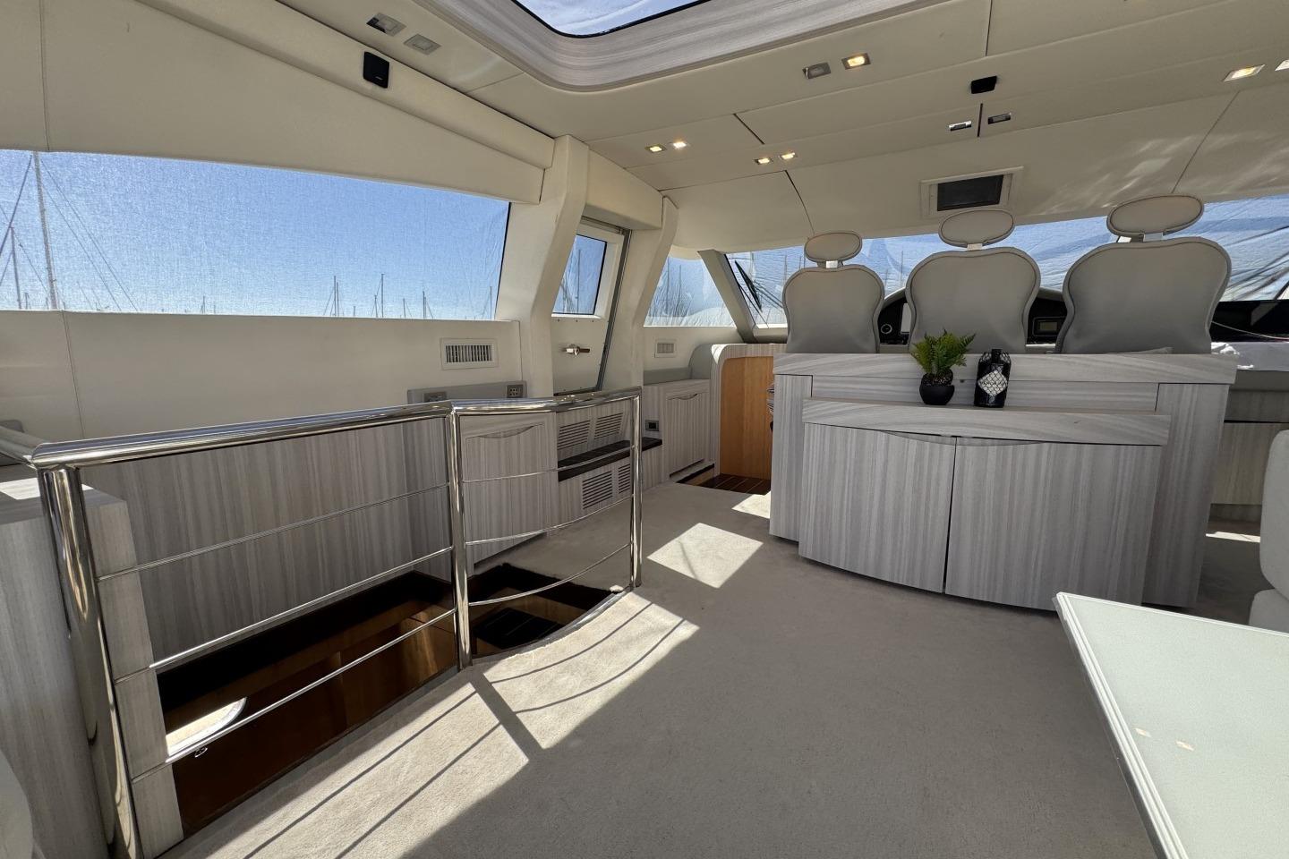 Luxurious interior of 2007 AB 78 yacht with modern seating and elegant decor.