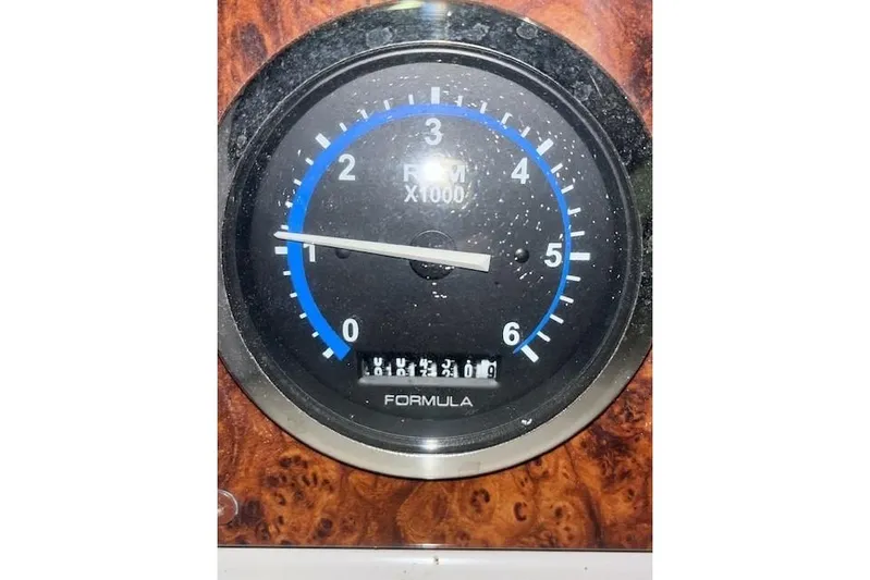  Yacht Photos Pics Tachometer of 2004 Formula 34 Performance Cruiser, displaying RPM and odometer readings.
