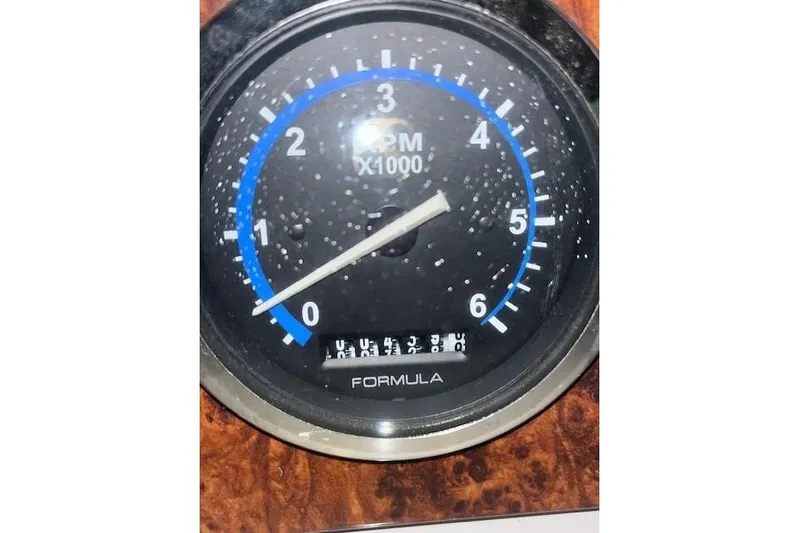 Yacht Photos Pics Tachometer of 2004 Formula 34 Performance Cruiser, displaying RPM in thousands.