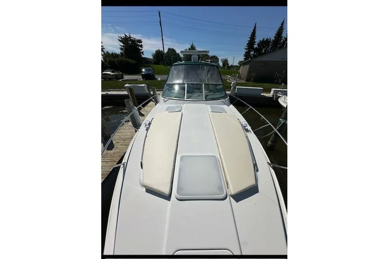  Yacht Photos Pics 2004 Formula 34 Performance Cruiser docked, showcasing sleek design and spacious deck.