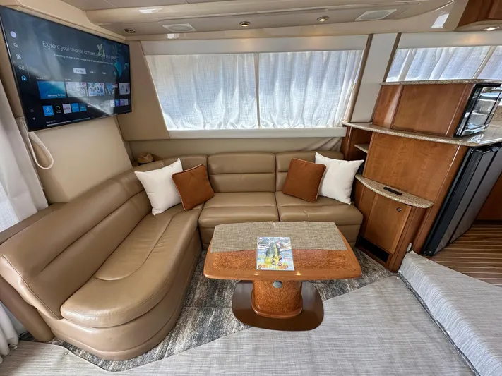 Vrpro Yacht Photos Pics Luxurious interior of a 2007 Meridian 411 Sedan yacht with leather seating and modern amenities.