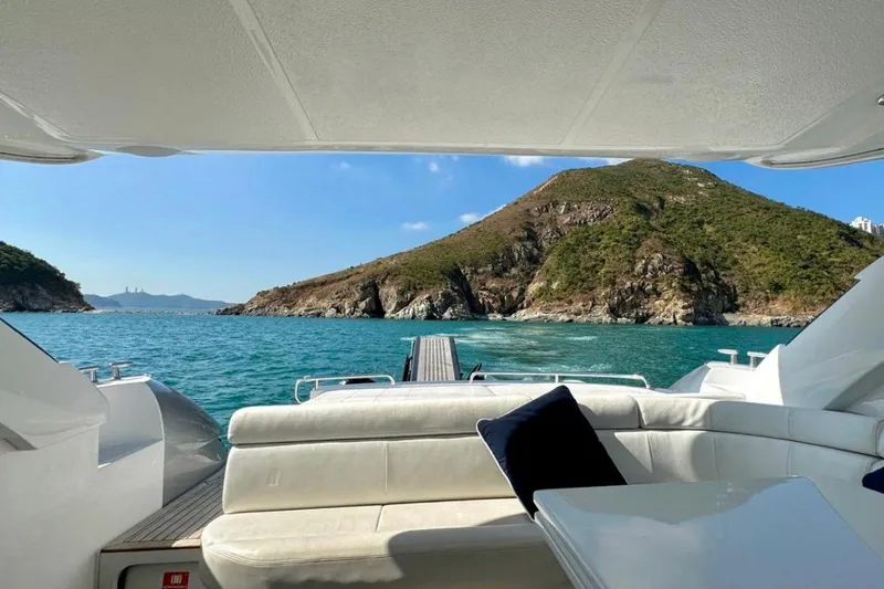  Yacht Photos Pics Luxurious 2007 Pershing 50 yacht with scenic ocean and island view.