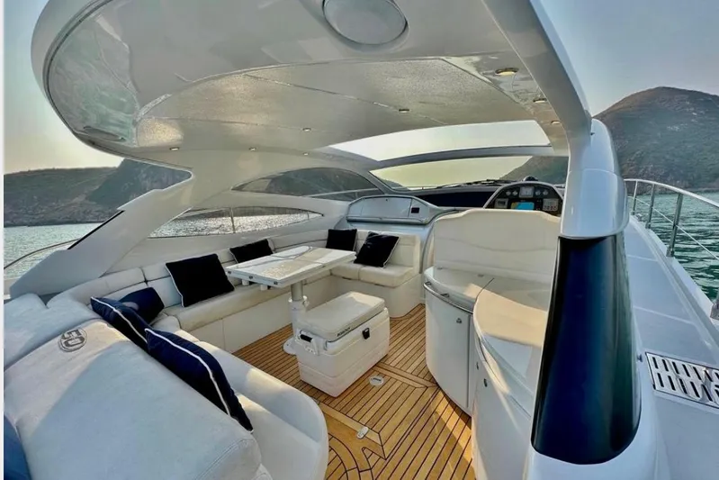  Yacht Photos Pics Luxurious 2007 Pershing 50 yacht interior with elegant seating and scenic ocean view.