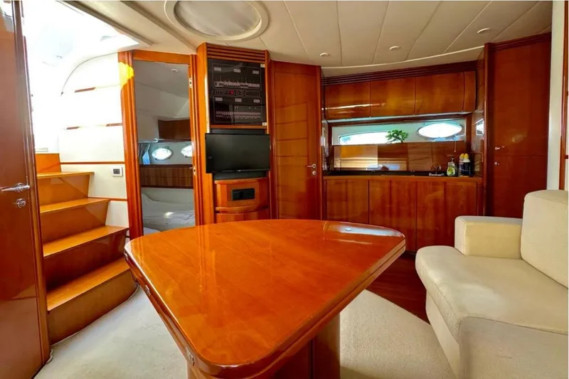  Yacht Photos Pics Luxurious interior of 2007 Pershing 50 yacht with wooden finishes and modern amenities.