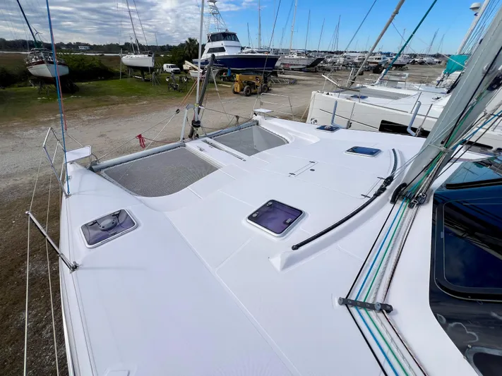 Kestrel Yacht Photos Pics 2020 Seawind 1260 catamaran on land, showcasing deck and hatches.