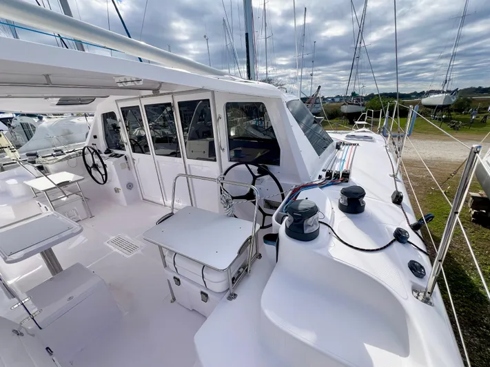 Kestrel Yacht Photos Pics 2020 Seawind 1260 catamaran deck with dual steering wheels and modern design.