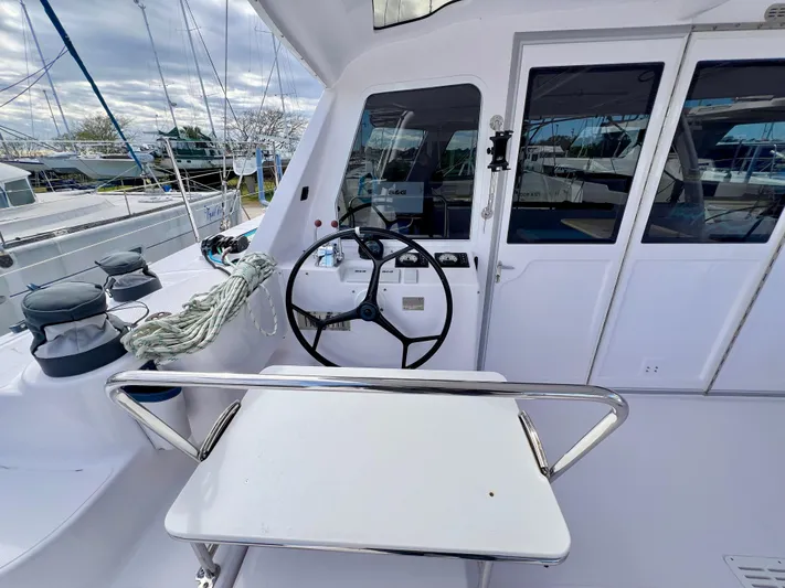 Kestrel Yacht Photos Pics Seawind 1260 catamaran cockpit with steering wheel and seating, 2020 model.