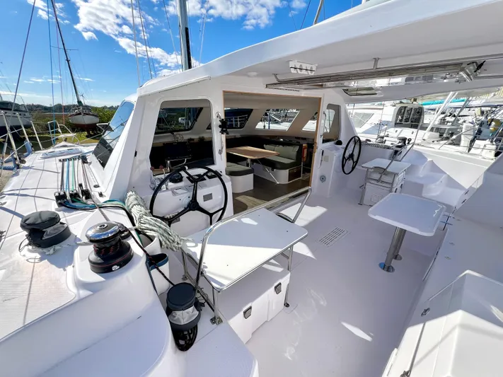 Kestrel Yacht Photos Pics 2020 Seawind 1260 catamaran cockpit with dual steering wheels and spacious seating area.