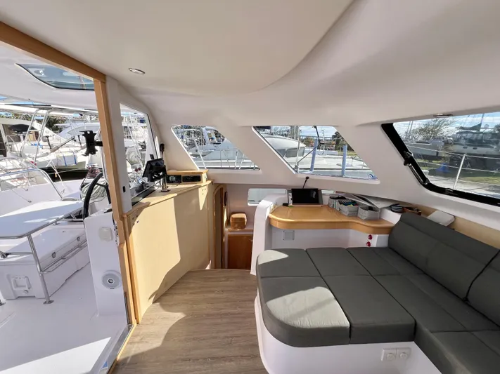 Kestrel Yacht Photos Pics Interior of 2020 Seawind 1260 catamaran with modern seating and navigation area.