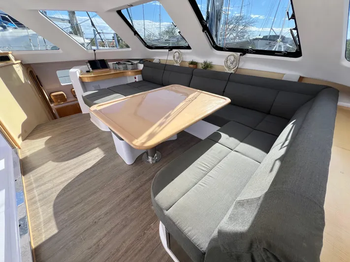 Kestrel Yacht Photos Pics Interior of 2020 Seawind 1260 catamaran with spacious seating and dining area.
