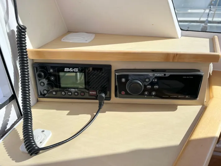 Kestrel Yacht Photos Pics Seawind 1260 2020 yacht radio and audio system on wooden dashboard.
