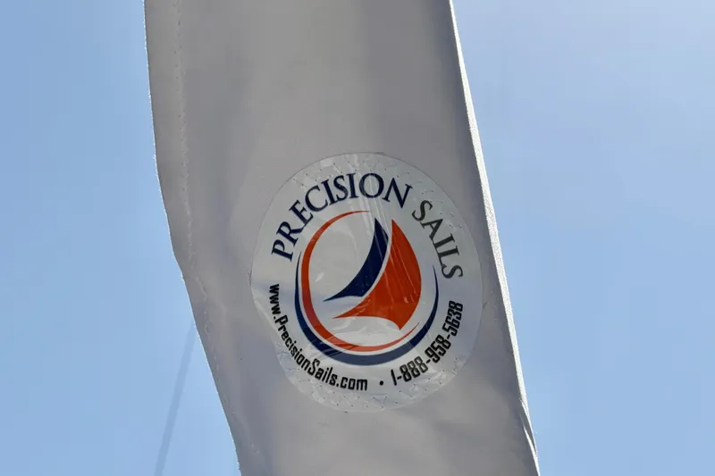 Kestrel Yacht Photos Pics Sail with Precision Sails logo on a Seawind 1260, 2020 model, under clear sky.
