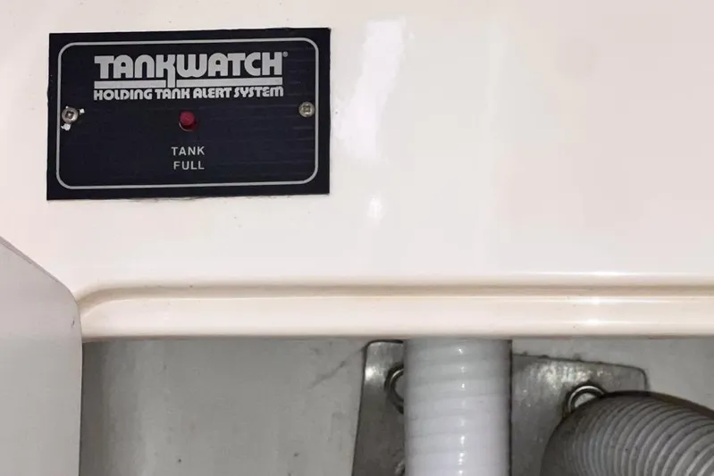 Next Of Kin Yacht Photos Pics TankWatch holding tank alert system on Leopard 38, 2000 model, indicating tank full.