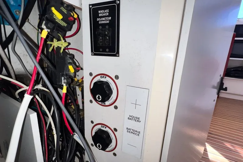 Next Of Kin Yacht Photos Pics Electrical panel with windlass breaker and battery switches on a 2000 Leopard 38.