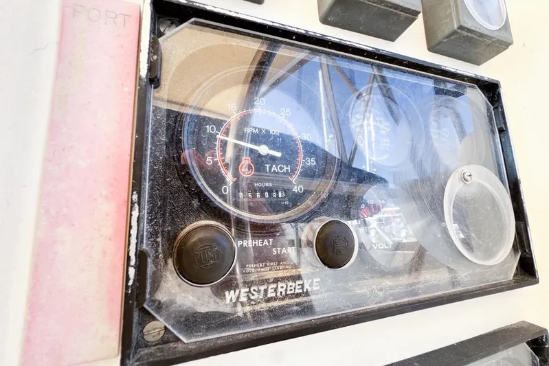 Next Of Kin Yacht Photos Pics Control panel of a 2000 Leopard 38 boat with Westerbeke tachometer.