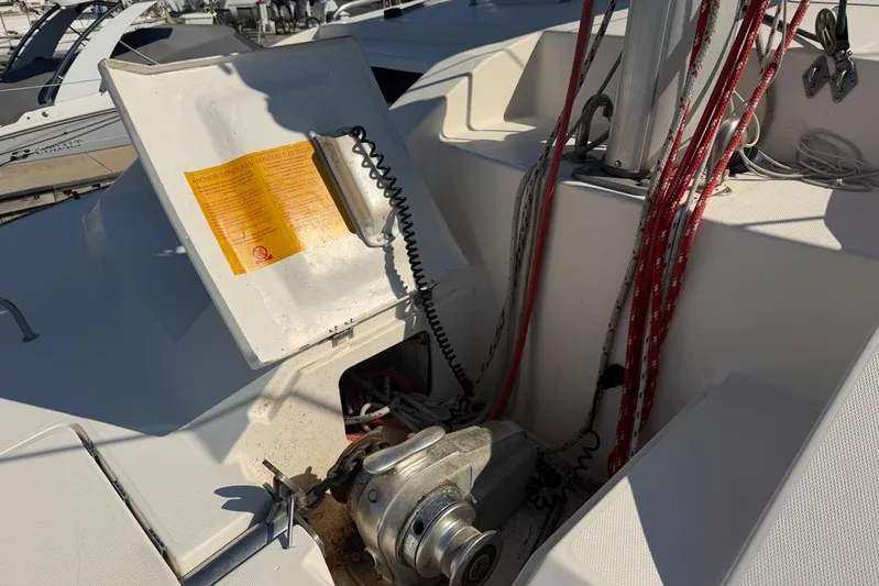 Next Of Kin Yacht Photos Pics Sailboat deck with winch and ropes, Leopard 38 model, year 2000.