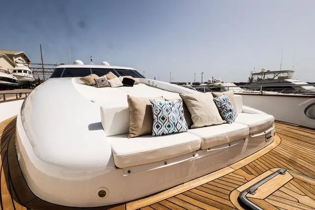 Eacos Yacht Photos Pics Luxurious Tecnomar Velvet 90 yacht deck with plush seating and decorative cushions, 2003 model.
