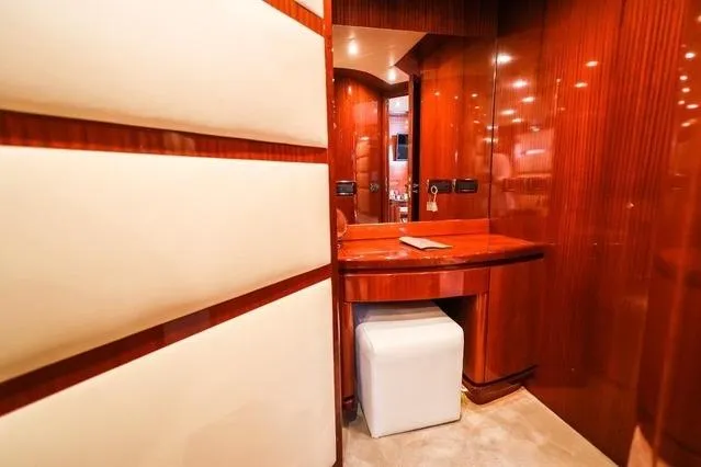 Eacos Yacht Photos Pics Luxurious interior of 2003 Tecnomar Velvet 90 yacht with elegant wood finish.