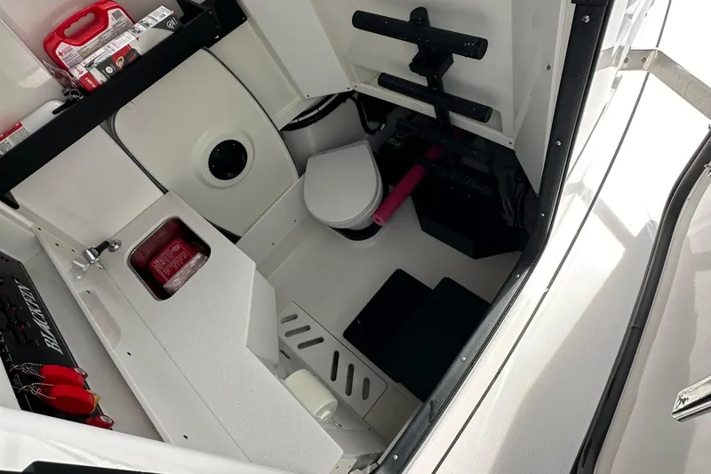  Yacht Photos Pics Interior of a 2021 Blackfin 332 CC boat, featuring a compact bathroom setup.
