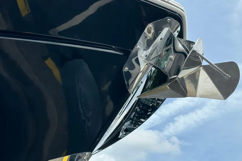 Yacht Photos Pics Close-up of 2021 Blackfin 332 CC boat anchor against a blue sky.