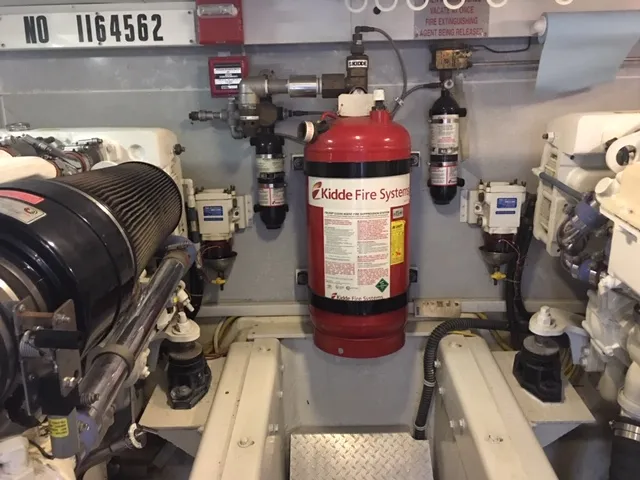 Silver Lining Yacht Photos Pics 2005 Marquis Fly Bridge engine room with Kidde fire suppression system.