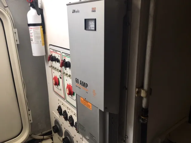 Silver Lining Yacht Photos Pics Electrical panel and fire extinguisher on a 2005 Marquis Fly Bridge yacht.