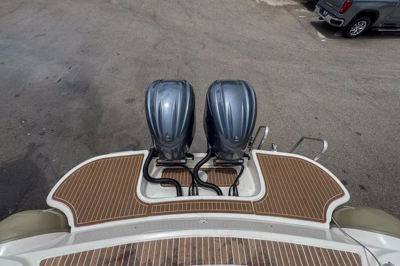  Yacht Photos Pics 2023 Tender Impertus 36 boat with dual outboard motors and teak deck.