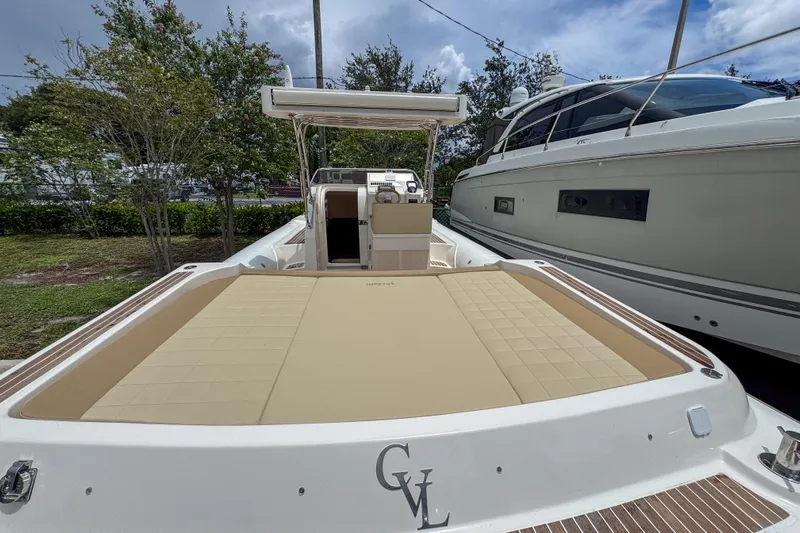  Yacht Photos Pics 2023 Tender Impertus 36 boat with spacious deck and modern design.