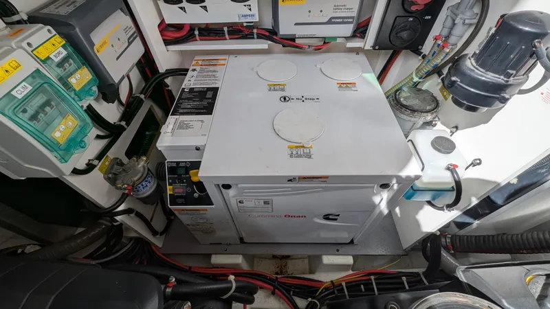 Best Life Yacht Photos Pics Engine room of 2019 Beneteau GT 46 yacht, featuring electrical components and wiring.