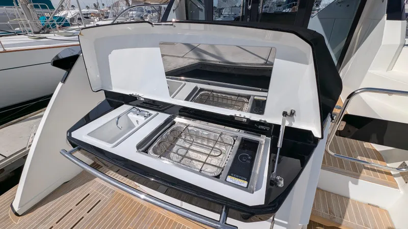 Best Life Yacht Photos Pics Outdoor kitchen on 2019 Beneteau GT 46 yacht with grill and sink.
