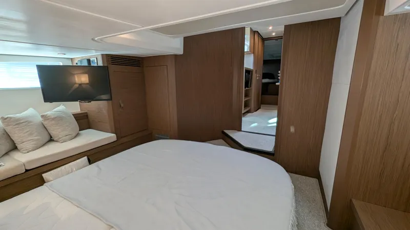 Best Life Yacht Photos Pics Luxurious interior of 2019 Beneteau GT 46 yacht with modern furnishings and cozy seating.