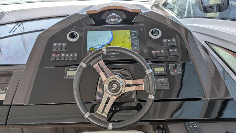 Best Life Yacht Photos Pics Steering console of 2019 Beneteau GT 46 yacht with navigation display.