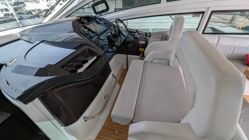Best Life Yacht Photos Pics 2019 Beneteau GT 46 yacht cockpit with modern helm and comfortable seating.