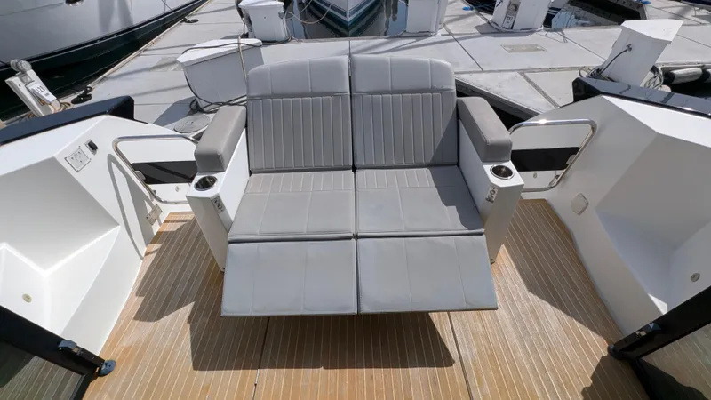 Best Life Yacht Photos Pics 2019 Beneteau GT 46 yacht with gray seating on deck.