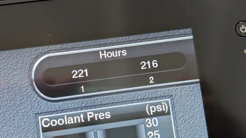 Best Life Yacht Photos Pics Display screen showing engine hours and coolant pressure on 2019 Beneteau GT 46.
