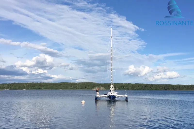  Yacht Photos Pics Sailboat Dragonfly 40 on calm lake under blue sky, 2021 model.