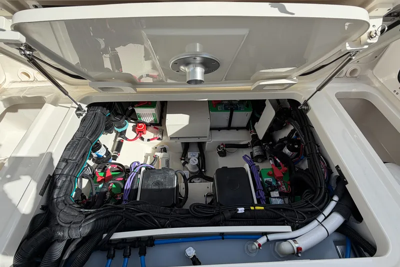  Yacht Photos Pics 2022 Boston Whaler 320 Vantage engine compartment with wiring and components visible.