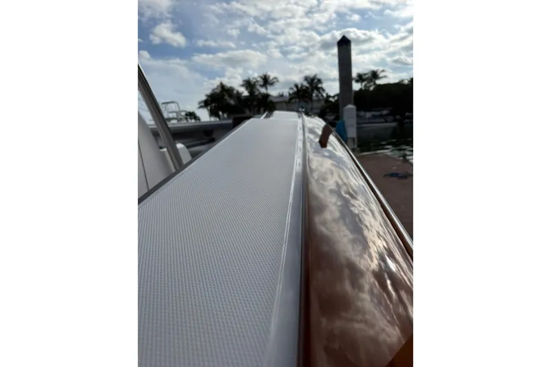  Yacht Photos Pics 2026 Mag Bay 43 CC boat detail with sky and dock in background.