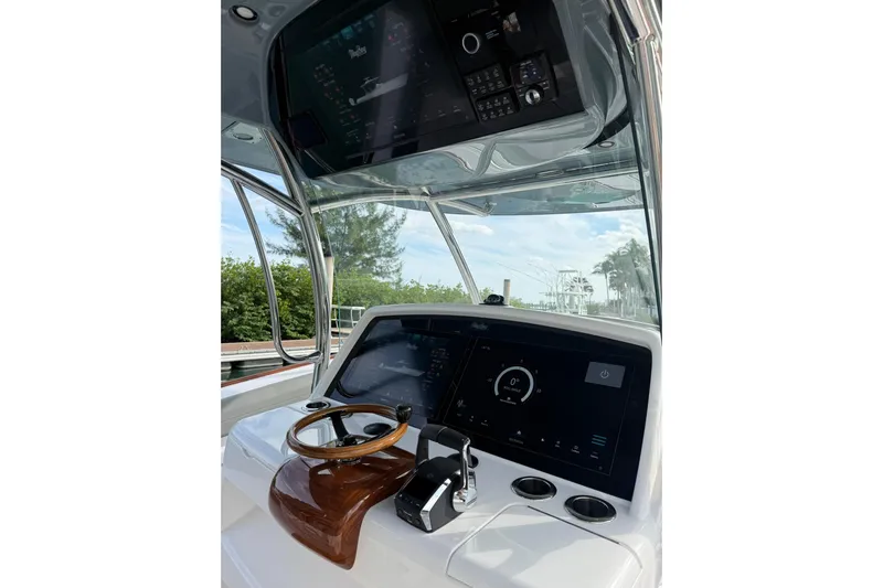  Yacht Photos Pics 2026 Mag Bay 43 CC boat helm with advanced navigation displays and controls.