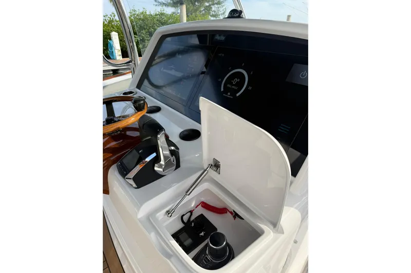  Yacht Photos Pics 2026 Mag Bay 43 CC helm with modern controls and display screen.
