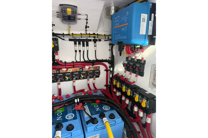  Yacht Photos Pics Electrical system of 2026 Mag Bay 43 CC boat, featuring batteries and wiring.