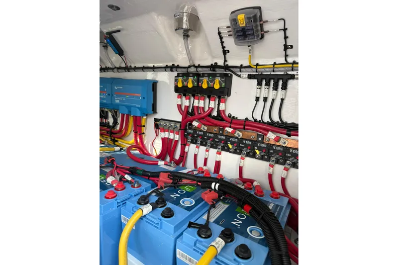  Yacht Photos Pics Electrical system of 2026 Mag Bay 43 CC boat, featuring batteries and wiring.